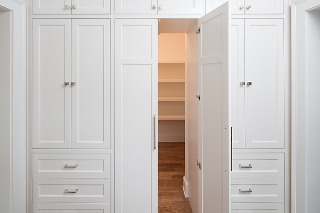 Walk in pantry We created a really cool feature in the butler’s pantry with floor to ceiling custom cabinetry. The center doors open to a full-size pantry including a secondary appliance garage #walkinpantry #pantry #kitchenpantry #appliancegarage