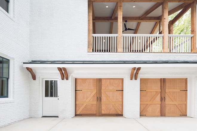 Brick exterior with Cedar beams and cedar Garage doors Painted Brick exterior with Cedar beams and cedar Garage doors #Brickexterior #Cedarbeams #cedarGaragedoor