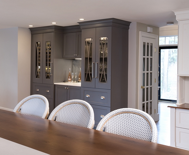 Kitchen Bar Cabinet Purposed cabinetry zones were installed including a tall pantry with many pullouts and custom shelving as secondary storage for dry goods and appliances #kitchen #barcabinet #kitchenbar