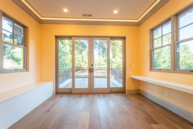 Bedroom Sitting Area Bedroom Home Office The sitting area/home office opens to a private balcony #sittingarea #homeoffice #balcony