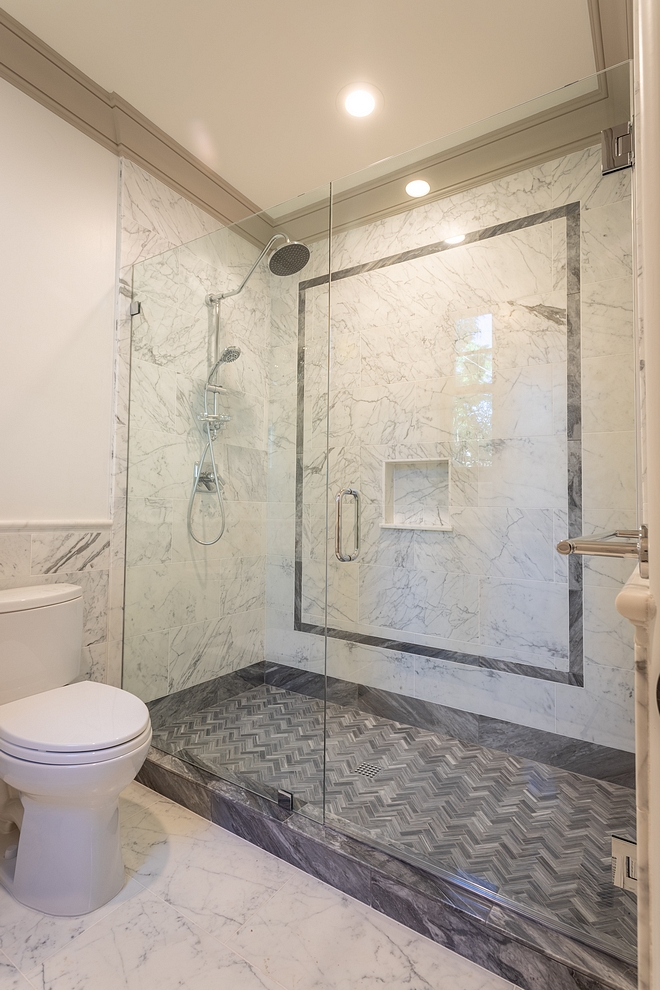 Bardiglio Nuvolato marble tile Bathroom Tile Grey and white marble tiling add some drama and an inspiring color scheme to this bathroom White and Grey Bathroom Tile with grey trim #WhiteandGreytile #BathroomTile