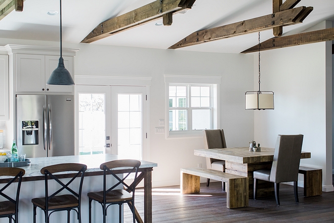 Breakfast Nook The breakfast nook was kept simple with a dining table and bench set, clean-lined dining chairs and a drum chandelier #BreakfastNook