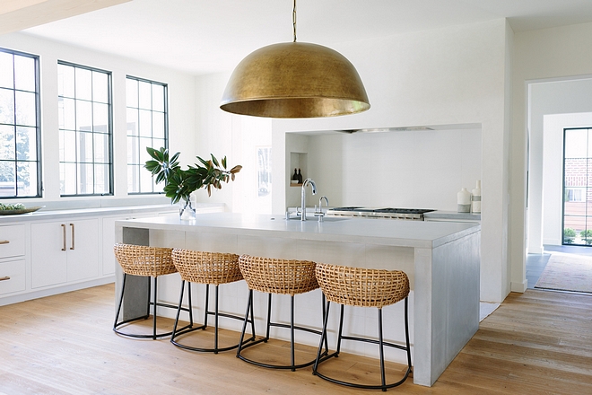 Kitchen Lighting Our client really pushed for the single-pendant over their custom concrete island. She wanted something minimalist, large scale, that added a modern glam element to the room #kitchenlighting #kitchen #lighting