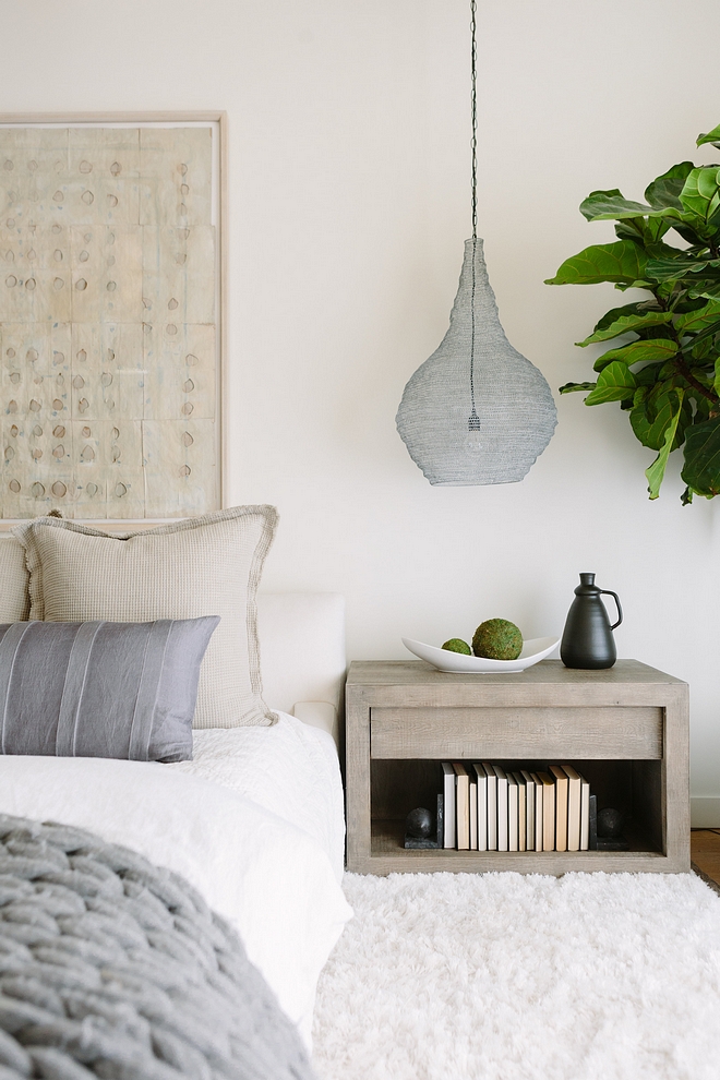 Bedroom From the plush upholstered bed, shag rug, and layered knitted textures, the room is indulgently cozy #bedroom #upholsteredbed #shagrug #knitted #textures