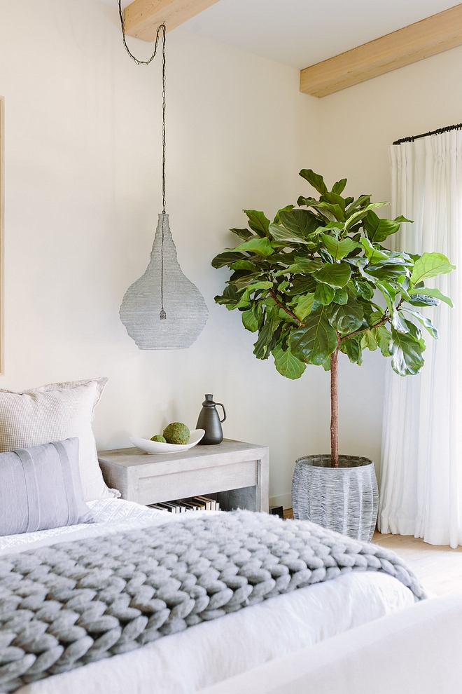 White bedroom eith white an grey color scheme The paint color is Benjamin Moore White Dove #whitebedroom #BenjaminMooreWhiteDove