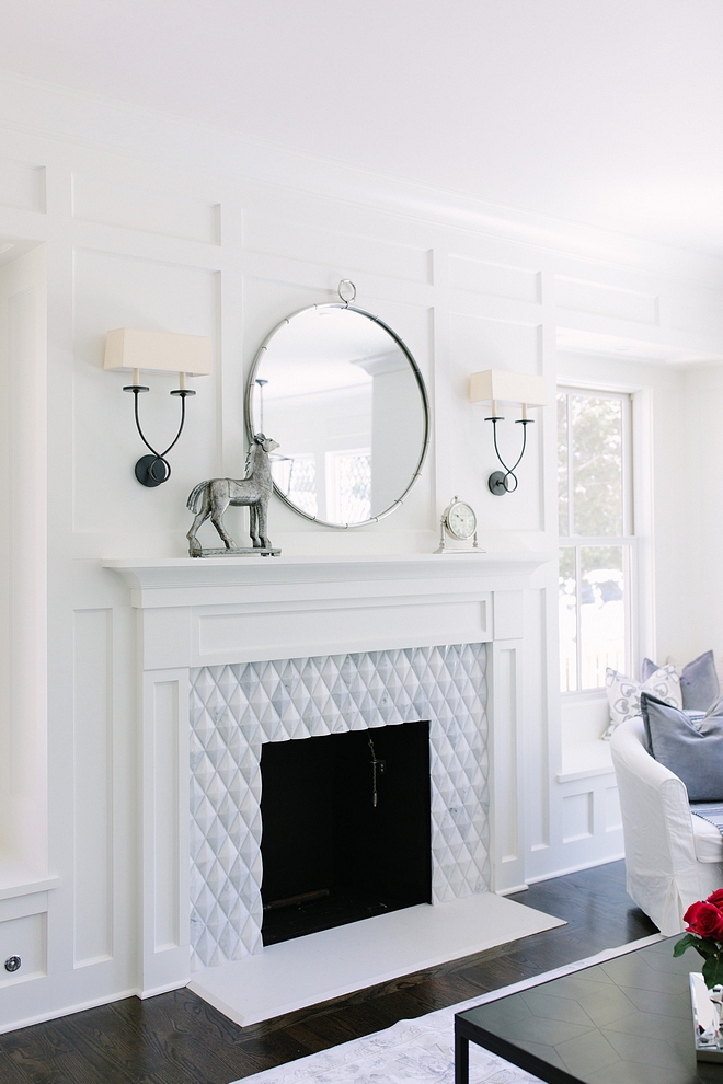 Wood burning fireplace using trim to create window seats on either side and a really fun tile around the surround #fireplace #woodburnfireplace