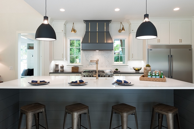 Two toned kitchen The variation in colors and textures makes this kitchen stand out from the rest. The center island is a whooping 11' in width Two toned kitchen #Twotonedkitchen