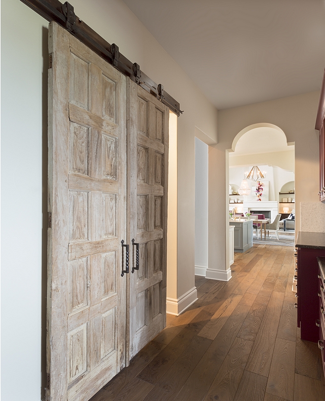 Vintage Doors used as Barn Door Reclaimed Barn Door Handing Vintage Doors with Barn Door hardware #VintageDoors #BarnDoor #ReclaimedBarnDoor #BarnDoorhardware