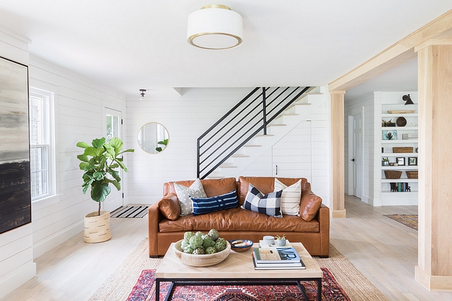 Modern Farmhouse Living Room We layered buffalo check, mudcloth and other patterned pillows on the sofas which provide visual interest (and comfort) without being too matchy-matchy 2540 Love ©AlyssaRosenheck #ModernFarmhouse #LivingRoom
