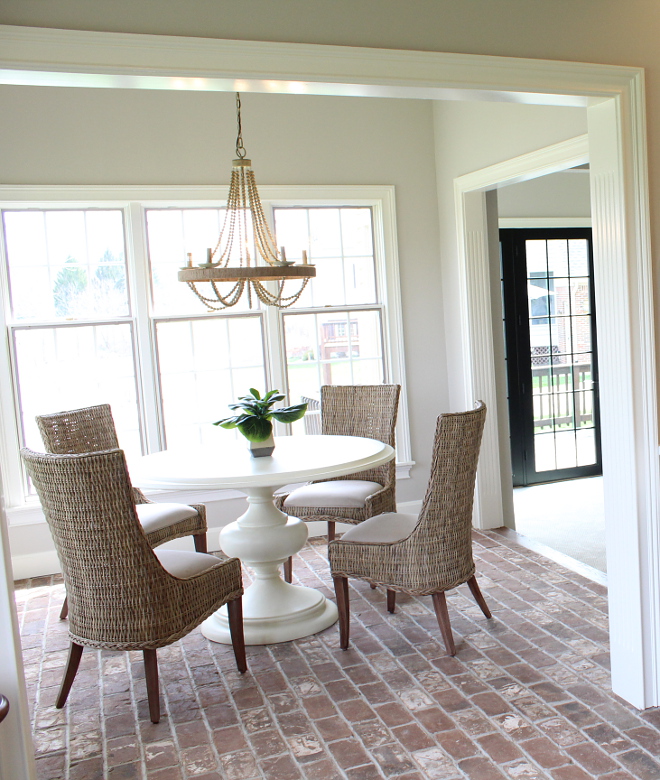 Worldly Gray Sherwin Williams Breakfast nook painted in Worldly Gray Sherwin Williams with brick flooring Worldly Gray Sherwin Williams #WorldlyGraySherwinWilliams #WorldlyGray #SherwinWilliams #SherwinWilliamspaintcolor