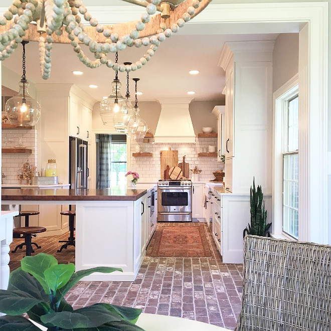 Farmhouse Kitchen Renovation with new cabinets, new flooring, brick flooring, new appliances and new large kitchen island #FarmhouseKitchenRenovation #FarmhouseKitchen #kitchenRenovation #FarmhouseRenovation