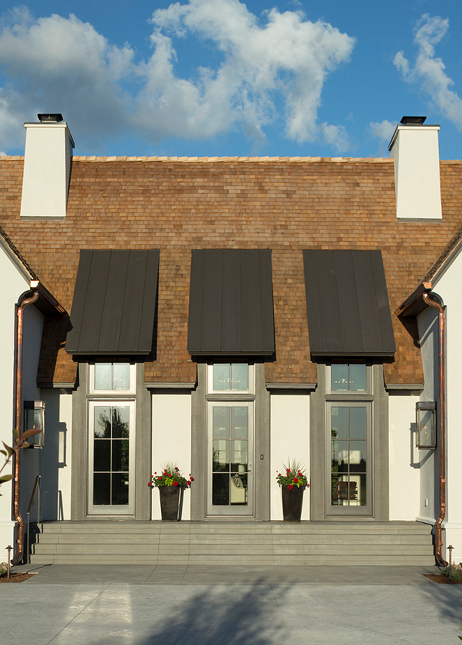 Front Door Metal and glass front door Metal and glass Front Door s Marvin Windows in Bronze I love the symmetry the windows on each side create #MetalandglassFrontDoor #FrontDoor