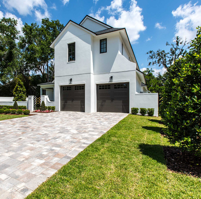 Sherwin Williams Urbane Bronze Dark Garage Doors paint color Sherwin Williams Urbane Bronze with white siding #SherwinWilliamsUrbaneBronze