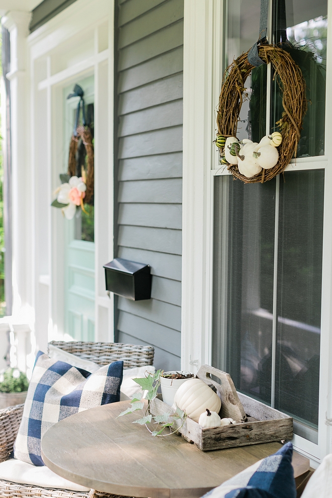 Front porch with porch table with Fall Decor white pumpkins and Fall wreaths #porch #frontporch #Fallwreath #whitepumpkin #falldecor