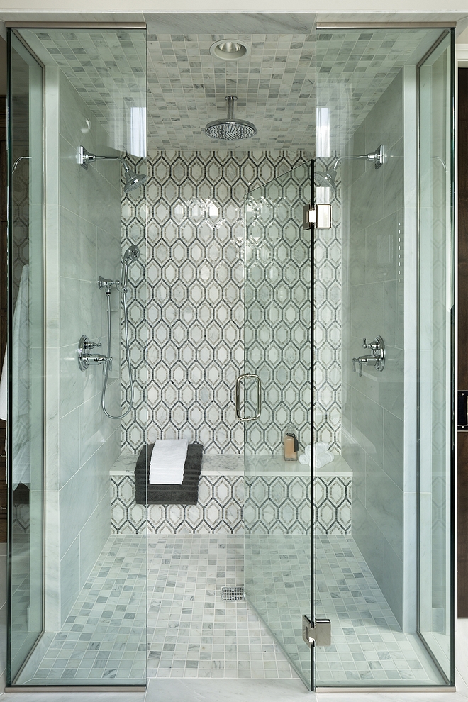 Shower Sources Shower: 12x24” Honed Marble Tile. Shower Floor: 2x2” Honed Carrara Marble Tile. Hansgrohe Rain Showerhead. Kohler Showerheads #showersources #shower #tile