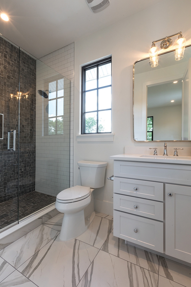Large floor tiles are a favorite of mine for bathrooms! They tend to be simple and don't make the space feel busy #bathroom #tile #bathroomtile #largetile
