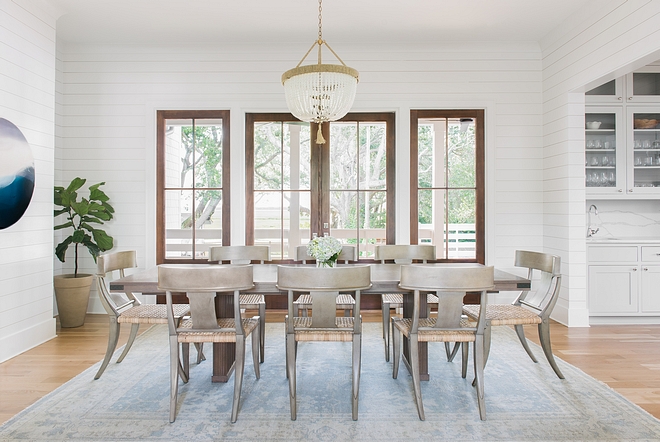 Dining Room Shiplap Dining Room Bright and airy dining room with shiplap walls painted in BM Chantilly Lace #diningroom #shiplap #diningroom #diningroomshiplap