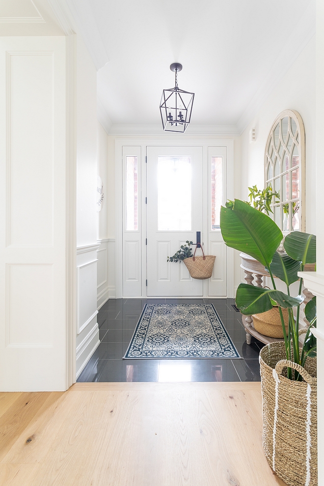 Foyer Runner Blue and white Foyer Runner Simple and clean-looking foyer decor with wainscotting, Latern pendant light and a blue and white runner Foyer Runner #FoyerRunner #Foyer #Runner #blueandwhiterunner