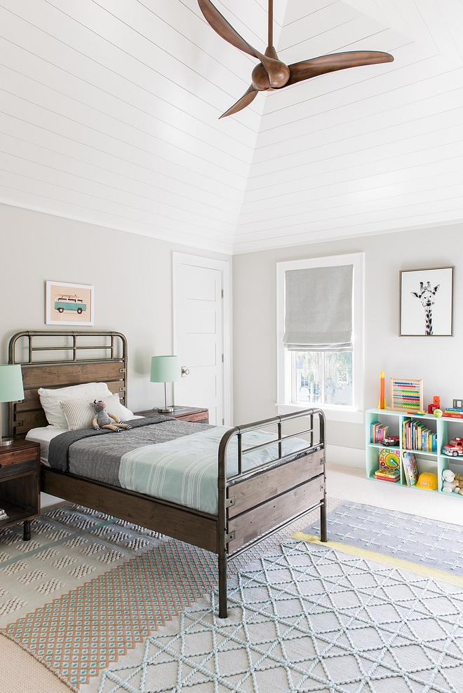 Benjamin Moore Rodeo This boys bedroom features a fresh and happy color palette. Also notice the vaulted ceiling with shiplap Bedroom paint color Benjamin Moore Rodeo #BenjaminMooreRodeo #boysbedroom #shiplap #vaultedceiling