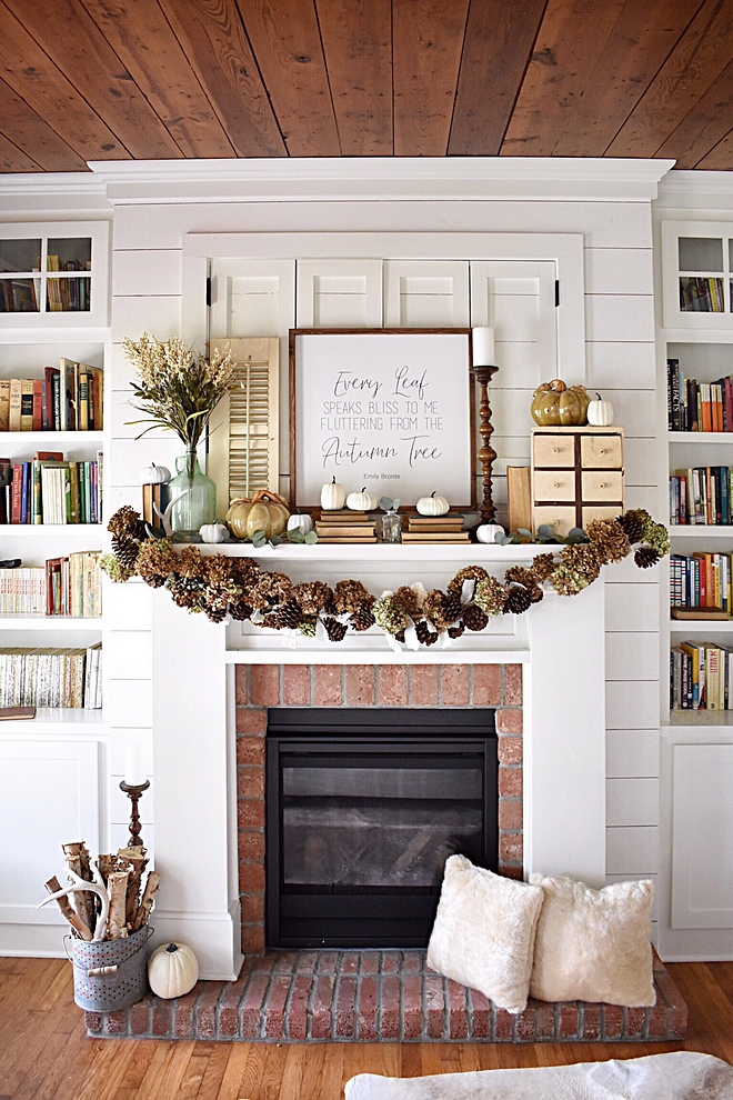 Mantel Garland Mantel Decor Last year for Christmas, I utilized dried hydrangeas everywhere in the cottage. I saved them to reuse and ended up making this unique fall garland! I took nine feet of rope and wired dried hydrangeas and pine cones, interwined with rag ties from white fabrics purchased at Goodwill and yard sales. All other accessories were sourced from thrift stores and yard sales #manteldecor #mantel #garland