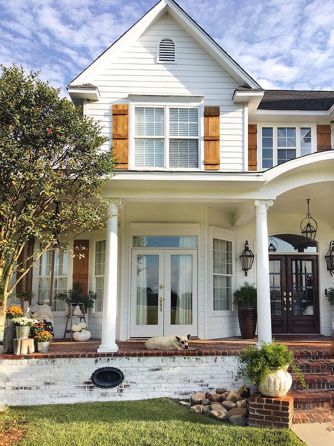 Farmhouse Cedar Shutters and brick porch