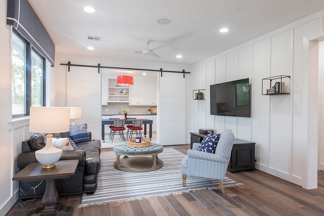 Landing Area Board and batten landing area This landing area is a dream! I really am in love with this! I can see the kids enjoying this space for reading, watching TV or just hanging out with friends A Craft room concealed with barn doors