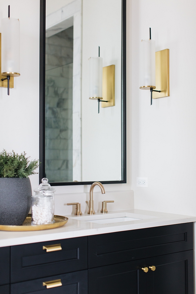 Bathroom with black cabinet painted in Benjamin Moore Black with brass accents Bathroom with black cabinet Bathroom with black cabinet #Bathroom #blackcabinet