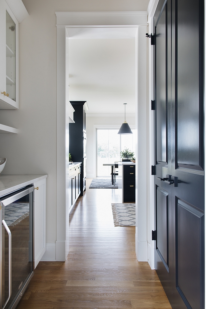 Black interior doors Black pantry door painted in Benjamin Moore Black #blackdoors #blackinteriordoor #blackBenjaminMoore #BenjaminMooreBlack