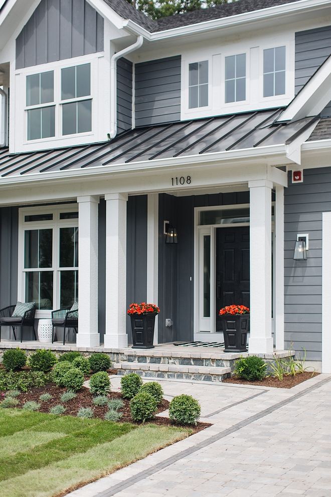 Porch Façade Stone Rustic Blue Machine Cut Driveaway and Paver front porch with black brick details #PorchFaçade #Stone #Driveaway #Paver #frontorch