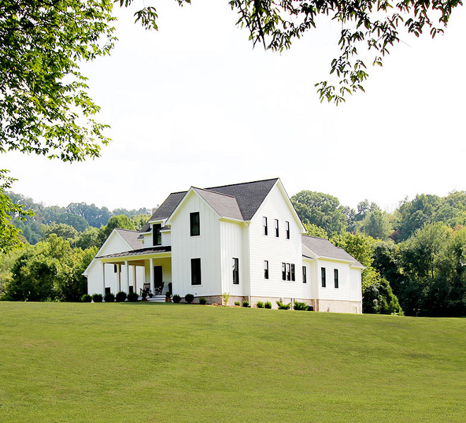 Clean and minimalist board and batten modern farmhouse exterior with front porch and black windows Siding is a combination of James Hardie, board and batten, and lap siding #Cleanmodernfarmhouse #minimalistfarmhouse #boardandbatten #modernfarmhouse #modernfarmhouseexterior