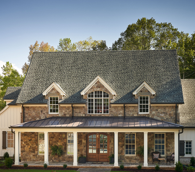 Double front door with brick porch Front Door: double. Tiffany TDL Mahogany Arch-top, 8-lite, 6’x8’. Glass is clear beveled low E. Hinge color is Oil Rubbed Bronze. Door is stained #frontdoor #porch #doubledoor