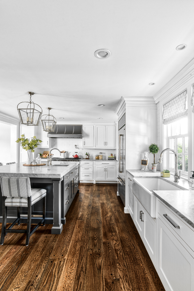 Kitchen Hardwood Flooring Hardwood flooring is a match to the original floors throughout- wide plank oak floors with walnut screw caps custom stained to about a dark walnut color #kitchenhardwoodflooring #Hardwoodflooring #originalfloors #wideplank #oakfloors #walnut #screwcapshardwoodflooring #customstained #darkwalnut