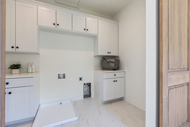 This home was staged and the washer and dryer weren't installed at the time these photos were taken I thought this is laundry room offers a great layout and I hope it inspires some of you Cabinets are painted in Benjamin Moore OC-117