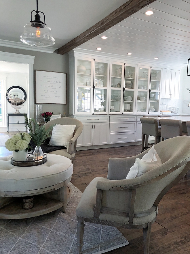 Sitting area off kitchen Sitting area off kitchen with round ottoman coffee table and Deconstructed chairs #sittingarea #Deconstructedchair #roundottomancoffeetable