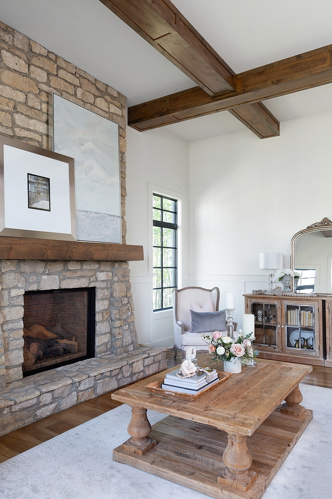 Farmhouse Living room with grey and beige stone fireplace and custom Alder ceiling Beams Farmhouse Living room with grey and beige stone fireplace and custom Alder ceiling Beams Rustic Farmhouse Living room with grey and beige stone fireplace and custom Alder ceiling Beams #Farmhouse #Livingroom #greyfireplace #beigestone #fireplace #Alderbeams #ceilingBeams