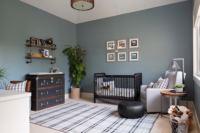 Boys Nursery Boys Nursery with plaid rug, trunk style dresser and spingle crib The whole room was repainted in a steely blue Boys Nursery #BoysNursery