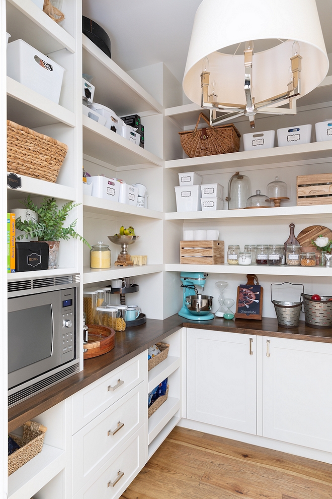 Pantry Pantry features a microwave oven I don't like the look of microwave in kitchen and putting it in the pantry is a great alternative #pantry