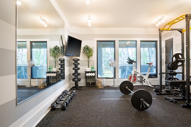 Home Gym The mounted TV is great for watching spin classes or YouTube workout videos – it’s like having a built-in trainer #homegym