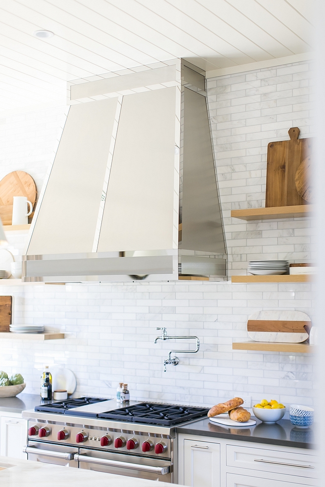 Kitchen Hood custom hood Hood finish is polished Chrome Chrome hood against countert o ceiling white marble subway tile #kitchen #hood #kitchenhood #whitemarblesubwaytile