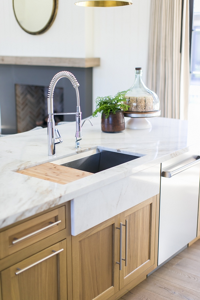 Kitchen sink The marble apron at sink came about from my conflict of I really wanting the island's long expanse of cabinets broken up by a farm sink, but also really wanting the functionality of Kohler's 8 degree sink #kitchensink #kitchen #sink #kicthen