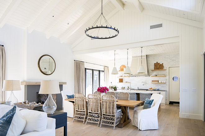 Open kitchen dining room and family room layout with different ceiling heights