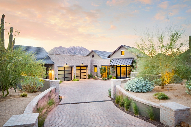 Arizona Modern Farmhouse New-construction Arizona Modern Farmhouse with metal roof brick exterior and brick driveway #Arizona #ModernFarmhouse