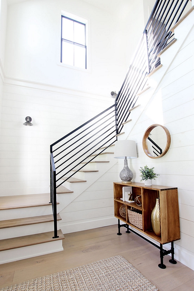 Vertical Metal Railing Modern Farmhouse Railing We went with a simple black industrial metal railing. We love the clean modern lines it creates in this space, and it goes perfectly with the windows and lighting. And the best part is that it was more affordable than traditional wood railing Vertical Metal Railing #VerticalMetalRailing #VerticalRailing