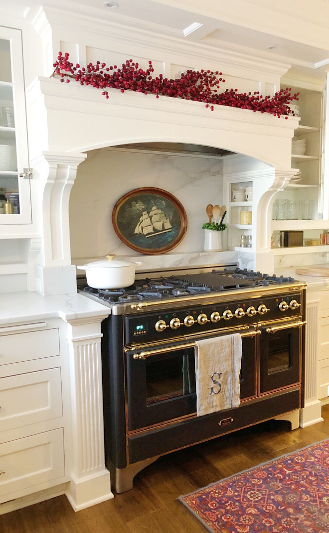 Christmas Kitchen Mantel Decor These faux berries are the easiest and perfect way to bring Christmas into the kitchen. Stove is Ilve, runner and clipper ship tray are antiques 