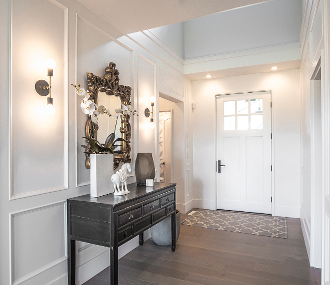 Oxford White by Benjamin Moore Bright foyer with custom paneled walls, painted in Benjamin Moore Oxford White CC-30 Benjamin Moore Oxford White CC-30 #BenjaminMooreOxfordWhite #BenjaminMooreOxfordWhiteCC30