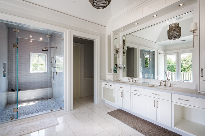 The master bathroom features a very spacious shower and an extensive cabinetry #bathroom #spaciousshower #shower #bathroomcabinetry