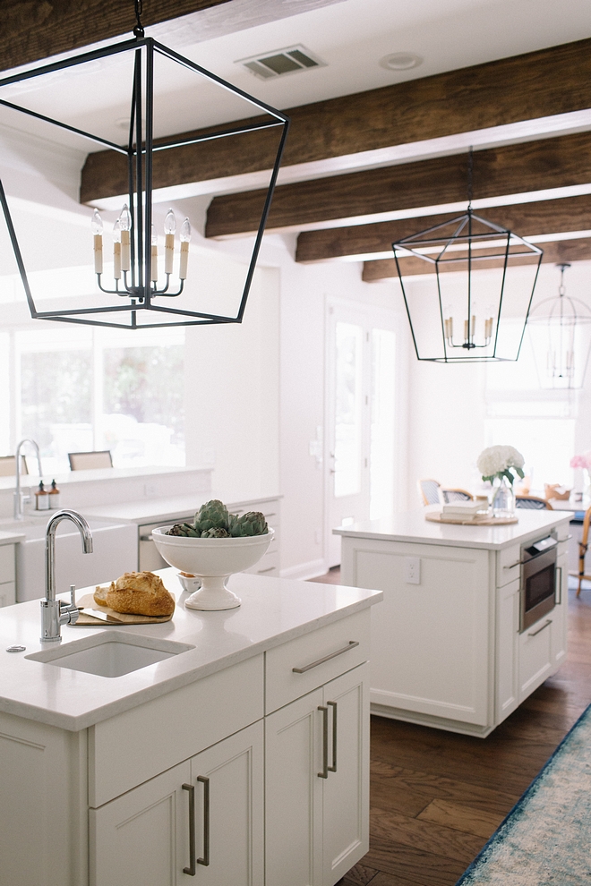 Kitchen island with two prep-islands, large ceiling beams, large pendant light over kitchen islands #kitchenisland #kicthenislands #largependantlight #doublekitchenisland #kitchens #kitchen #ceilingbeams #largebeams
