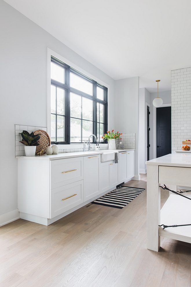 Kitchen with no upper cabinets No upper cabinets on kitchen On this side of the kitchen you will find only lower cabinets and a large window above the kitchen sink. You could add floating shelves, but honestly speaking I prefer this clean and airy look #kitchencabinets #lowercabinets #nouppercabinets