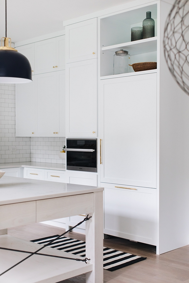 White Kitchen Cabinet Details Maple Shaker-style kitchen cabinet painted in Sherwin Williams Extra White, which is one the crispest whites you can get #WhiteKitchen #whitekitchenCabinet #cabinet #Shakerstylekitchencabinet #SherwinWilliamsExtraWhite