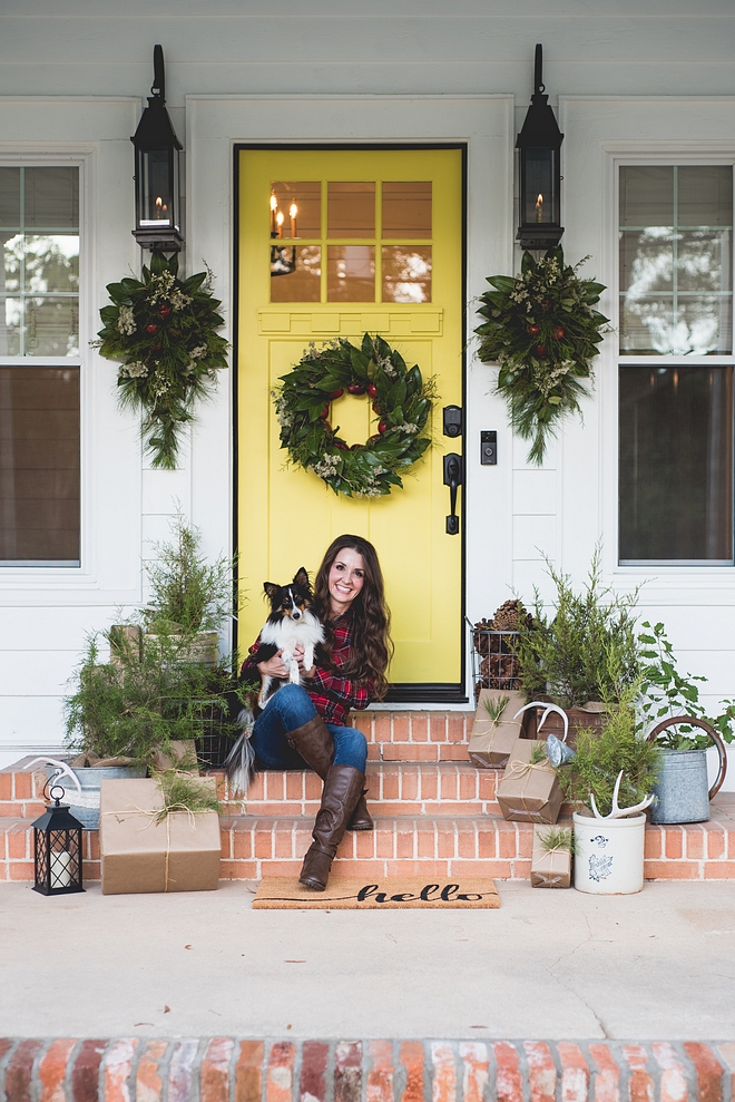 Everything seen here is crafted from greens found in nature. From my gas lanterns hang magnolia swags infused with apples, cedar, holly and pine (and you might even catch a hint of cloves). Then, I made a gorgeous magnolia wreath to match and it graces my bright yellow door. On the front steps, you’ll find parcels wrapped in brown paper nestled amongst small, fresh cedar trees